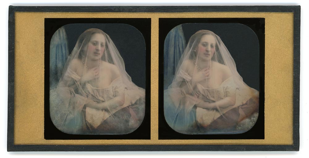 Stereo daguerreotype portrait of a woman in with a veil covering her face