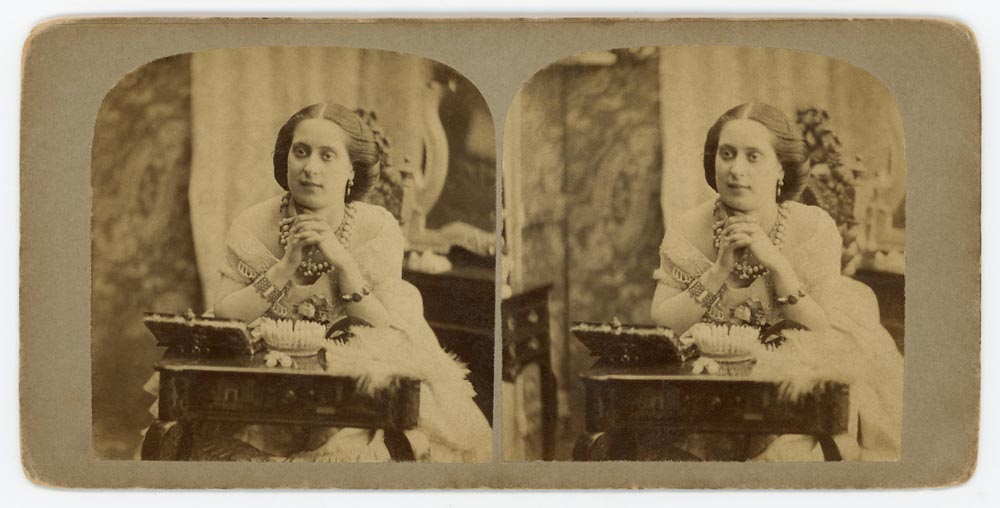 Vintage stereo card of a woman at a desk