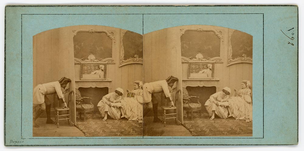 Vintage stereoview of man spying on two women