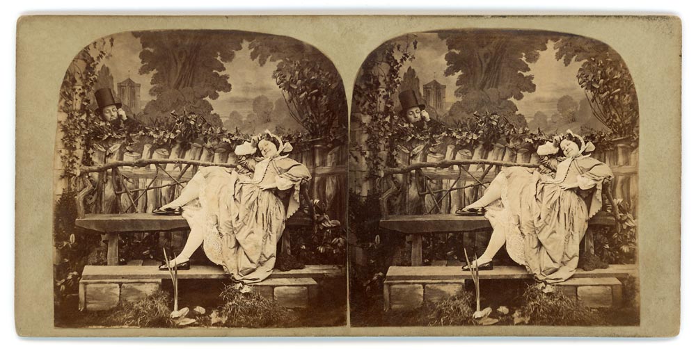 Vintage stereo view of a man in a top hat admiring a woman on a bench