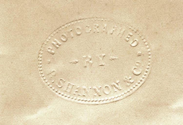Close up of early photography studio stamp